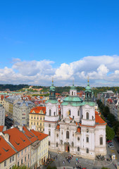 St. Nicolas Church and rooftops; Old Town in Prague. Copyspace