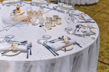 Decorated celebrating event table on sunny day outdoors background