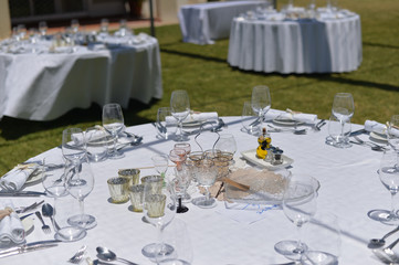 Decorated celebrating event table on sunny day outdoors background