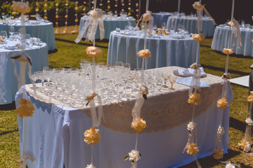 Decorated celebrating event table on sunny day outdoors background