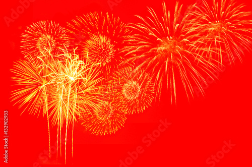 "Gold fireworks on red background." Immagini e Fotografie Royalty Free