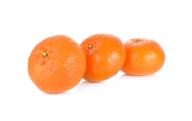 whole ripe mandarin orange on white background
