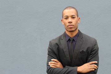 Man gracefully wearing a suit with copy space 