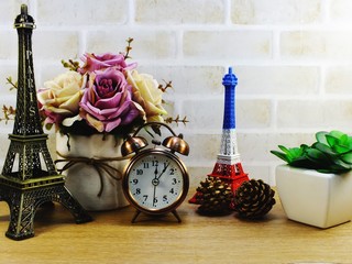 image of decorative eiffel tower and different home decor related objects