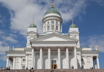 Fototapeta na wymiar People visit Helsinki Cathedral. opened in 1852, Helsinki Cathedral is an Evangelic Lutheran church located in the center of Helsinki.