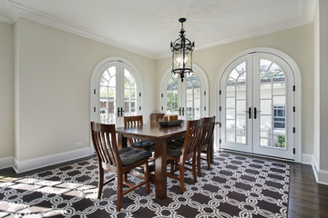 Dining room with circular doors