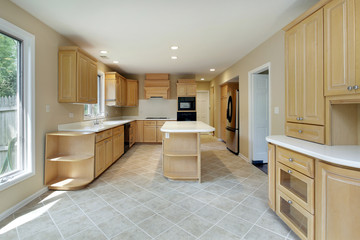 Kitchen with oak wood cabinetry