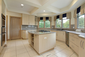 Kitchen with stove-top island