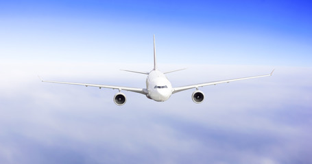 Airplane fly over clouds. Transportation travel concept