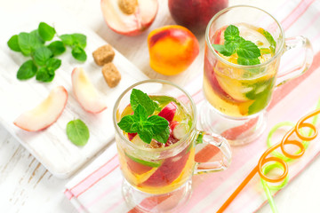 Peach ice tea and ingredients, selective focus