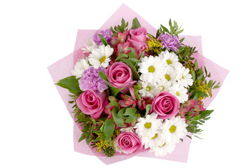 Bright buketny composition from fresh flowers, the white isolated background