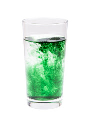 chlorophyll in glass isolated on white background