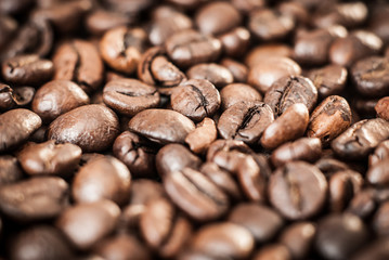 Coffee beans concept on wooden table background.
