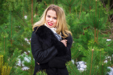 Naklejka premium Woman posing in pines