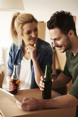 Couple looking forward to live in the new place .