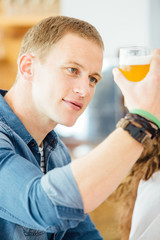 Man looking at light beer