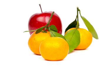 fresh mandarin and apple fruits on white
