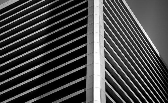 windows of commercial building in Hong Kong with B&W color