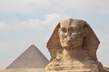 The Sphinx at Giza and ancient Egyptian pyramid in Giza, Cairo 