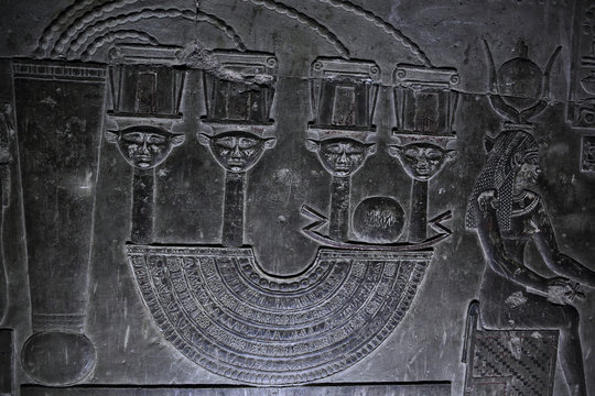 Hieroglyphic carvings and paintings on the interior walls of the temple