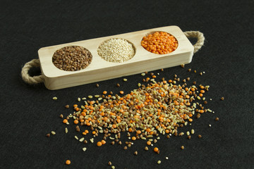 Heap from four different groats: buckwheat, lentil, quinoa, bulg