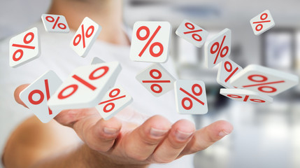 Fototapeta premium Businessman holding sales icons in his hand 3D rendering