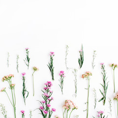 Colorful wildflowers on white background. Flat lay, top view. Valentine's background