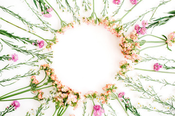 Wreath frame made of wildflowers. Flat lay, top view. Valentine's background