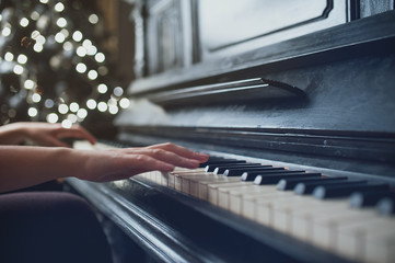 Her hands on the keyboard piano vintage © Dmitriy Shipilov
