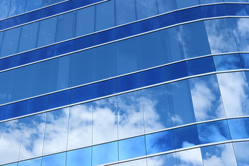 Fototapeta na wymiar Glass window reflect cloud sky