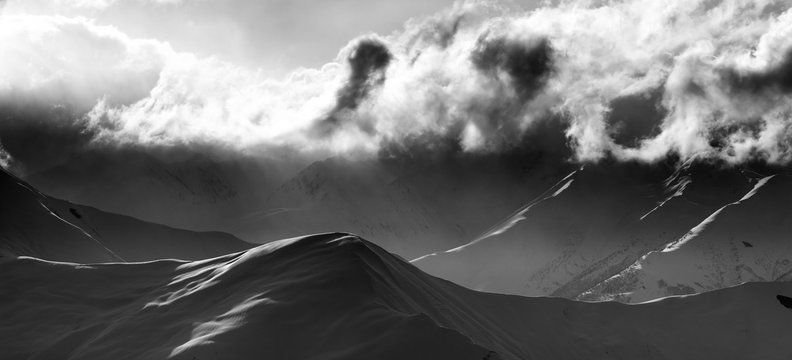Fototapeta Black and white on evening mountain and sunlight clouds