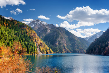 Fototapeta na wymiar Beautiful view of the Long Lake among fall woods and mountains