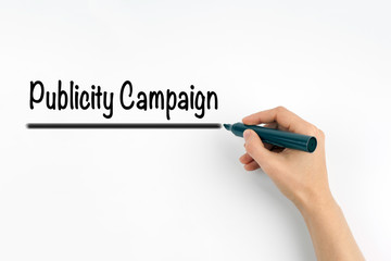 Publicity Campaign. Hand with marker writing on a white background.