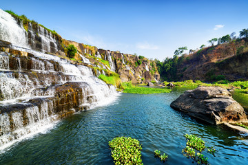 Amazing view of natural cascading waterfall with clear water