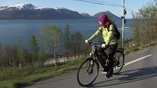 Woman driving bicycle