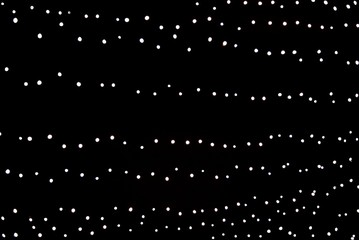 Garland against the sky at night, the lights in the sky