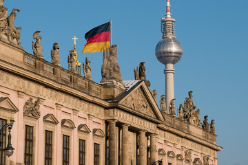 Berlin, Tv tower, historic building (Zeughaus) and german flag