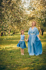 Happy mother and daughter in the park