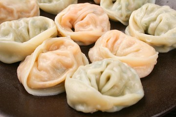 Obraz na płótnie Canvas Kimchi Dumplings on plate. kimchi mandu