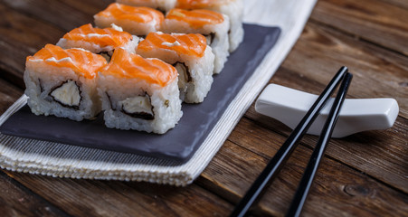 Delicious fresh rolls with salmon closeup