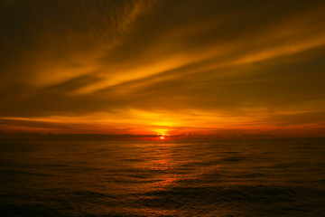 Scenic view of beautiful sunset above the sea. Beautiful cloud texture.