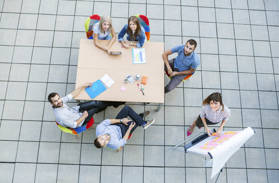 Businesswoman giving presentation in workshop outdoors