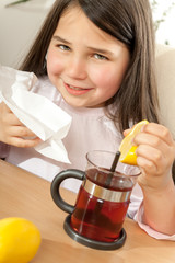 Mother and daughter with cold or flu