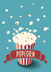 Striped red and white vector bucket of popcorn and ribbon.