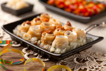 Rolled herring in olive, served with onions. Perfect for vodka.