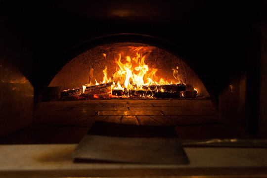 Burning pieces of wood in a fireplace