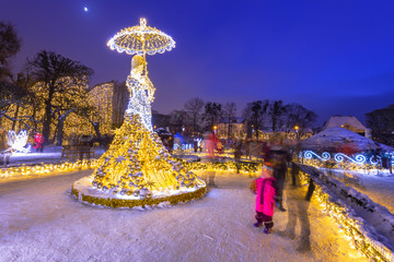 Beautiful illumination at public park Oliwski of Gdansk in winter, Poland - obrazy, fototapety, plakaty