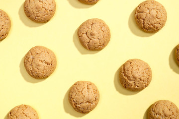 Pattern of cookies on a yellow background