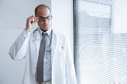 Portrait of doctor with eyeglasses and stethoscope