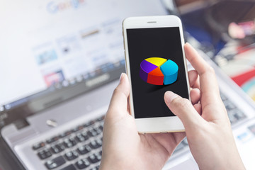 hand holding using mobile phone.girl using smart phone.